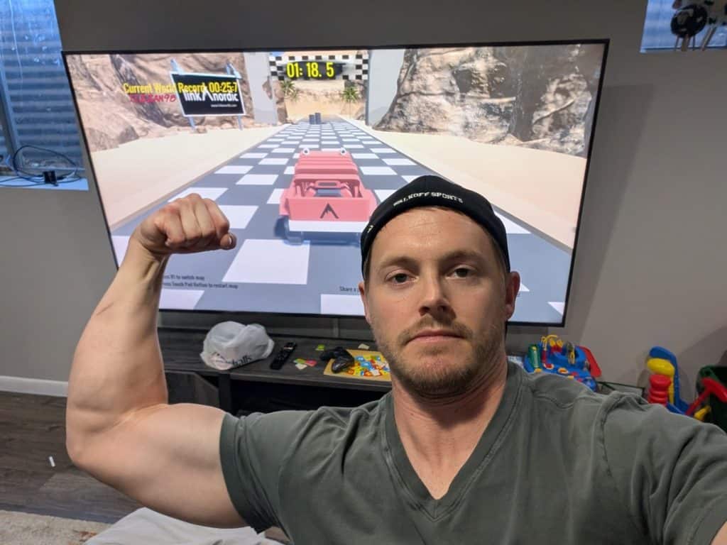 Selfie with the video game Racing Bros on TV